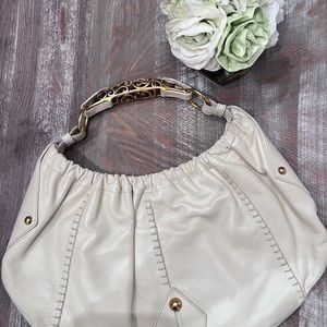 Yves Saint Laurent Gold handle Bag